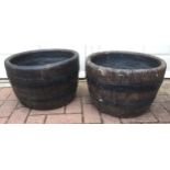 A pair of reconstituted stone barrel planters, approx 30cm high , 432cm diameter (2)