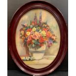 L. B. Hannon, A Vase of Summer flowers, signed, dated 1921, oil on board, 26cm x 33.5cm oval.