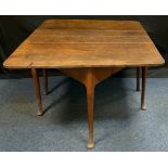 An early 19th century oak gate-leg dining table, rounded rectangular top, 112cm x 48cm (112cm x