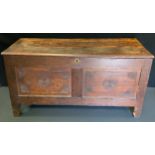 An 18th century oak blanket chest, 113cm wide x 45cm deep x 58.5 tall.