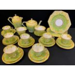 A Paragon Primrose pattern tea service, made for HM The Queen, comprising teapot, water jug, two