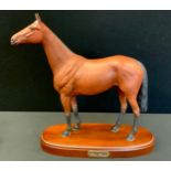 A Royal Doulton model, Red Rum, mahogany plinth;