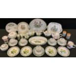 A Royal Worcester Herbs pattern part tea service, and kitchenware, comprising five tea cups,