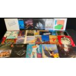 Vinyl records - albums and singles, including The Beatles, Rolling Stones, Genesis, David Bowie,