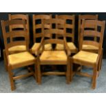 A set of eight contemporary oak dining chairs, comprising two carvers, and six chairs, (8).