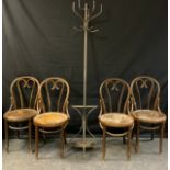 A set of four Thonet-type bentwood cafe chairs; a metal wall-mounted coat stand, (5).