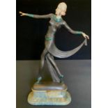 After Joseph Lorenzl, a bronze effect Art Deco figure as a Dancing Girl with outreached arms,
