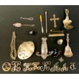 A silver coloured metal caddy spoon, marked 850; silver letters; mother-of-pearl brooch; thimble;