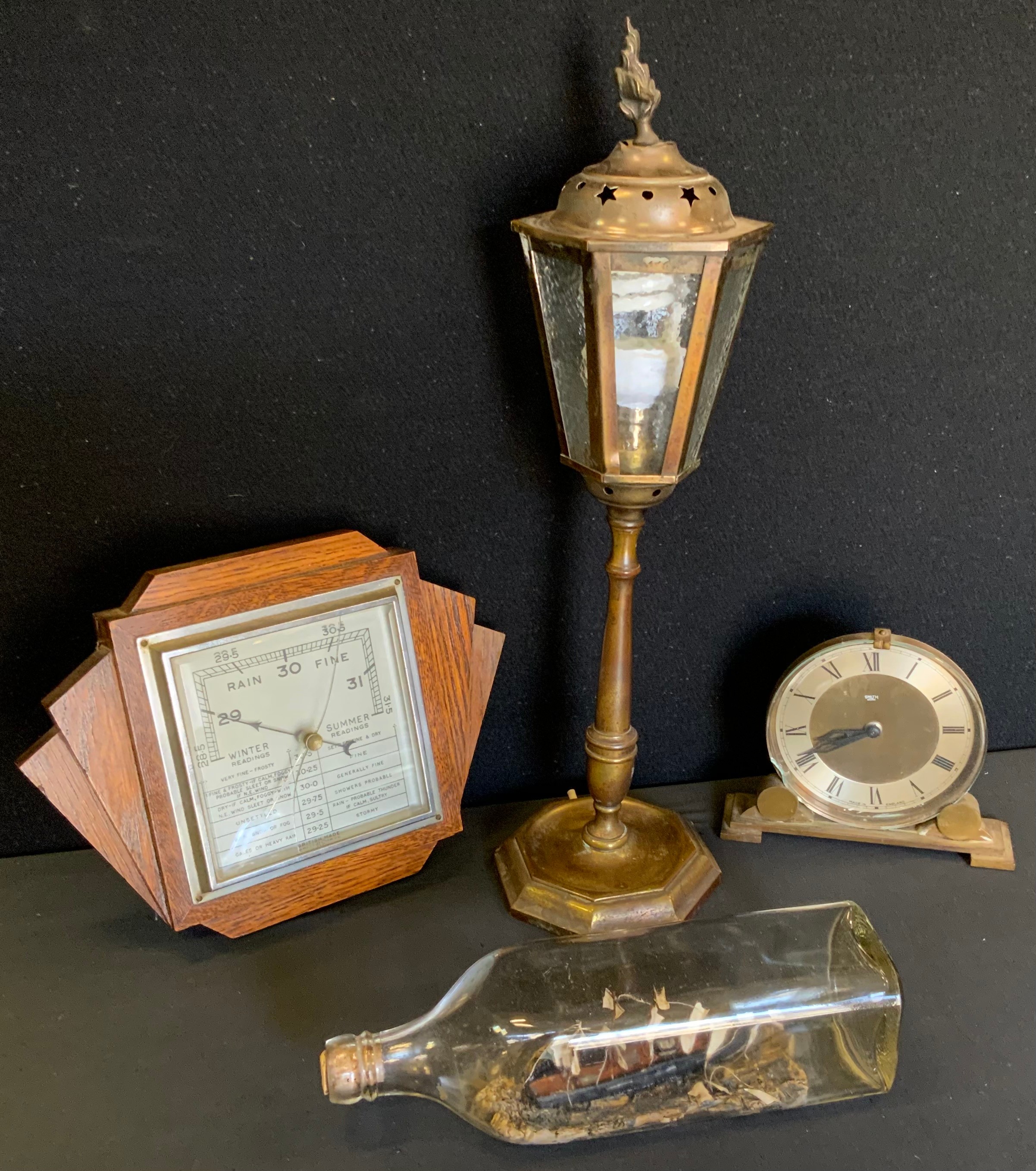 A Smiths Sectric Art Deco style mantel clock; barometer; lantern table lamp; ship in a bottle (4)