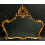 A Regency style wall mirror, scrolling gilt floral frame, shaped serpentine plate, 109cm high, 127cm