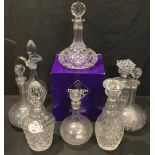 A pair of Victorian globular decanters; an Edinburgh Crystal ship's decanter; others including