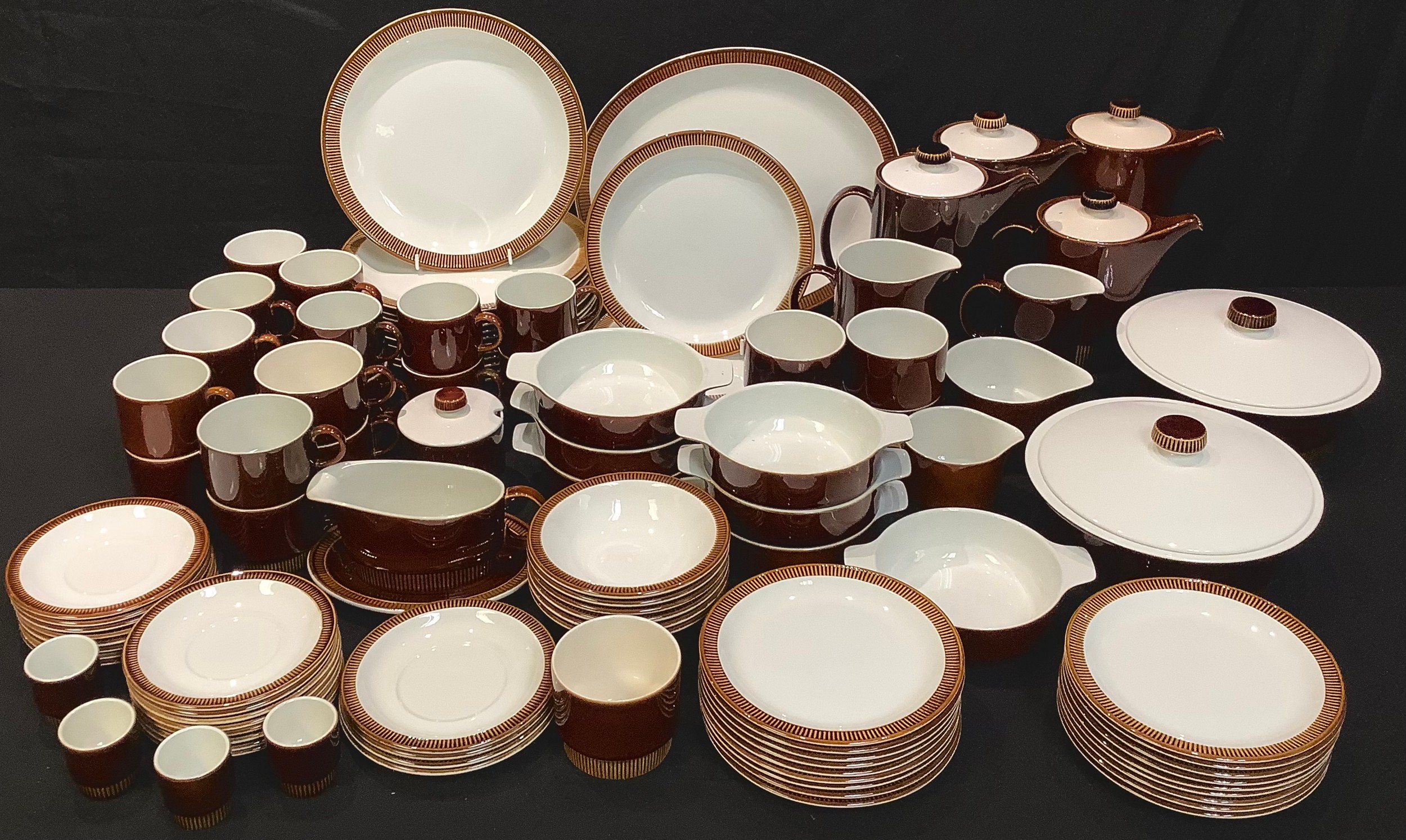 A Poole Chestnut Brown pattern dinner and tea service, mid-20th century