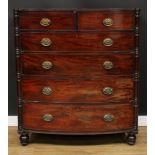 A Regency mahogany bow front chest, reeded-edge top above two short and four long graduated