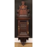 A 19th century Gothic Revival oak wall mounted country house post box, shaped cresting, moulded