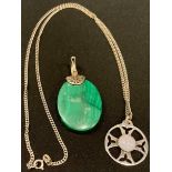 A hallmarked silver and moonstone pendant on silver neck chain; a large malachite and silver pendant