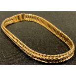 A 9ct gold railroad link bracelet, marked 375, 18cm long overall, 9.7g