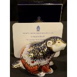 A Royal Crown Derby paperweight, Riverbank Beaver, limited edition 3,413/5,000, gold stopper, signed