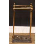 A Victorian brass and iron walking stick or umbrella stand, 62.5cm high, 32cm wide, 22.5cm deep