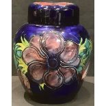 A Moorcroft anemone pattern ginger jar and cover, impressed mark, signed, 15cm high