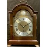 An Elliot mahogany bracket clock, eight day movement, Roman numerals on silvered chapter ring,