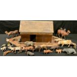 Folk Art - an early 20th century wooden Noah's ark with a collection of painted composition animals,