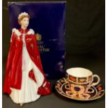 A Royal Crown Derby 1128 pattern cup and saucer, c.1932; a Royal Worcester model of Queen