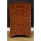 A George III style walnut veneer chest, of six long drawers, bracket feet, 101.5cm high, 61cm