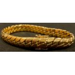 An 18ct gold bracelet, the clasp marked 750, 20cm long open, 37g