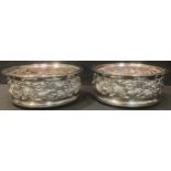 A pair of silver wine coasters, Sheffield 1994, 15cm diameter