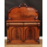 A Victorian mahogany chiffonier, arched back crested by a carved fruiting pear branch, the