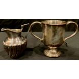 A Victorian silver spirally stop fluted cream jug, reeded angular handle, gilded interior,
