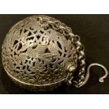 A Chinese incense ball, pierced with fanciful birds, gimbled interior, character marks to hinge, 5.