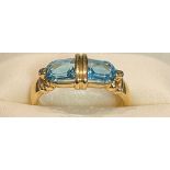 A 14k gold two stone topaz ring, size N, 3.3g