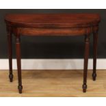 A George III mahogany D-shaped card table, hinged top, reeded tapered cylindrical legs, 68.5cm high,