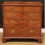 A George III oak chest, slightly oversailing top above two short and three long graduated cockbeaded