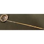 A George III silver punch ladle, gadrooned borders, twisted baleen handle, 36cm long, William Knight