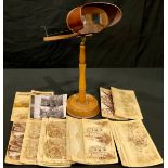 A mahogany stereoscope on stand with slides, including Derbyshire, Haddon Hall etc