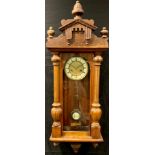 A late Victorian oak Vienna wall clock, 96cm high