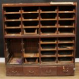 Retail Salvage - an early 20th century haberdashery shop display chest, 159cm high, 153cm wide, 54cm