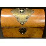 A Victorian walnut dome top stationery casket, the brass mounted hinged cover with porcelain