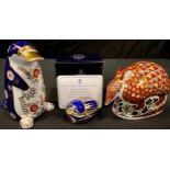 A Royal Crown Derby paperweight, Armadillo, gold stopper; others, Millennium Bug, gold stopper,