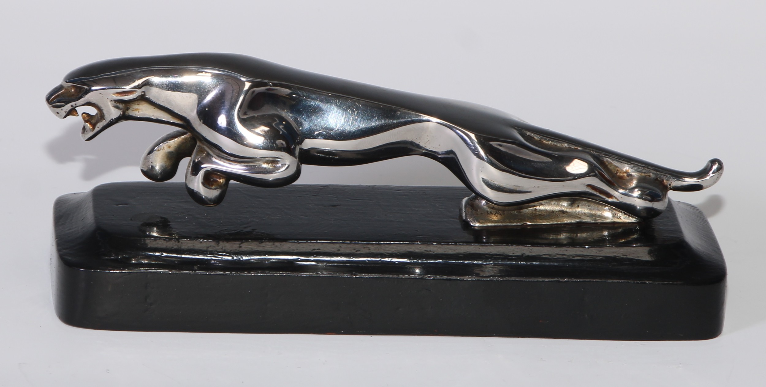 Automobilia - a Jaguar car mascot, mounted for the desk, 18.5cm long