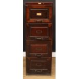 An early 20th century four-drawer filing cabinet, by Office Furniture Co., 184 Vauxhall Bridge Rd,