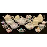 Teapots - a Royal Creamware reproduction Victorian and Albert Museum house shaped teapot, 15cm;