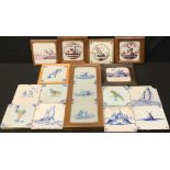 A collection of Delft tiles, various designs including figures, architecture, animals, sailing