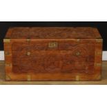 A Chinese inspired brass mounted camphor lined chest or trunk, the exterior carved with dragons,