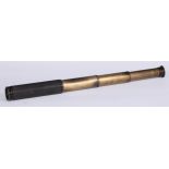 An early 20th century lacquered brass three-draw pocket telescope, by J T Coppock, Leeds leather