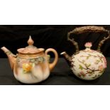 A Hadley's Worcester lobed ovoid teapot, painted with roses on a blush ground, the cover with