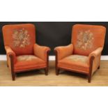 A pair of early 20th century Howard type armchairs, 92cm high, 82cm wide, the seat 52cm wide and