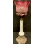 An acid etched cranberry flashed lamp shade, an opaque glass oil lamp stand with detached